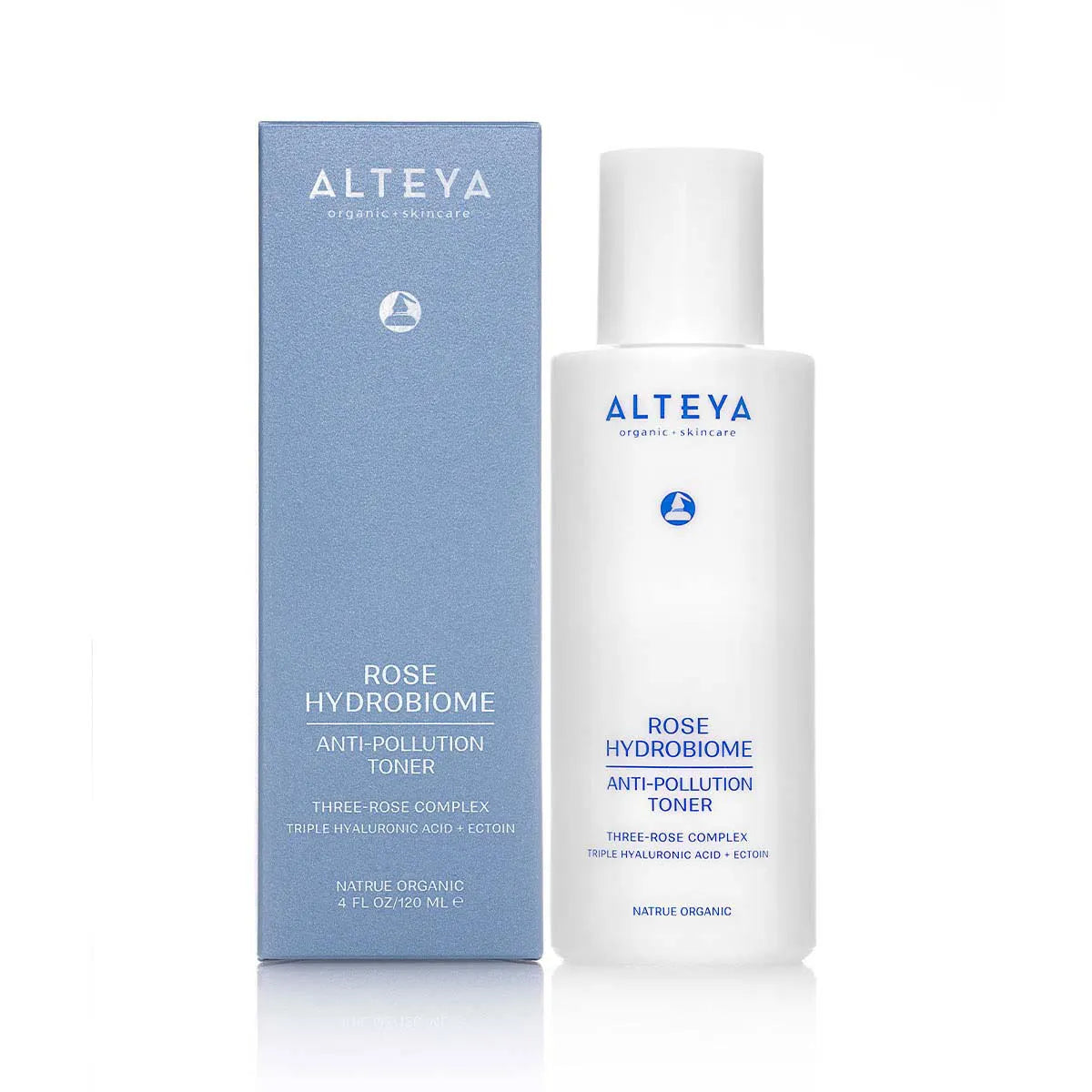 A bottle of Rose Hydrobiome Anti-Pollution Toner skincare product, alongside its packaging box. both items are labeled as certified organic.