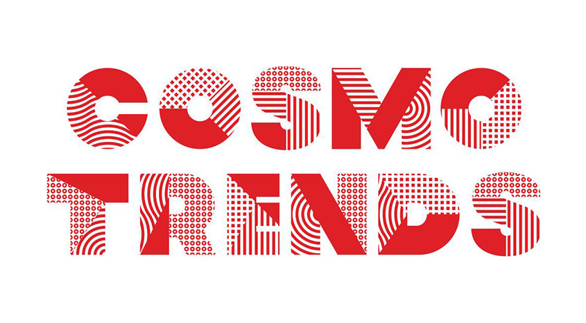 Cosmo trends logo featuring red stripes and a hint of the iconic Bulgarian rose, Rosa Damascena.