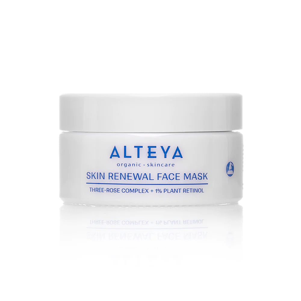 A white jar of Rose Hydrobiome Skin Renewal Face Mask by Alteya Organic Skincare, labeled with &quot;Three-Rose Complex + 1% Plant Retinol,&quot; promises deep hydration and a natural glow.