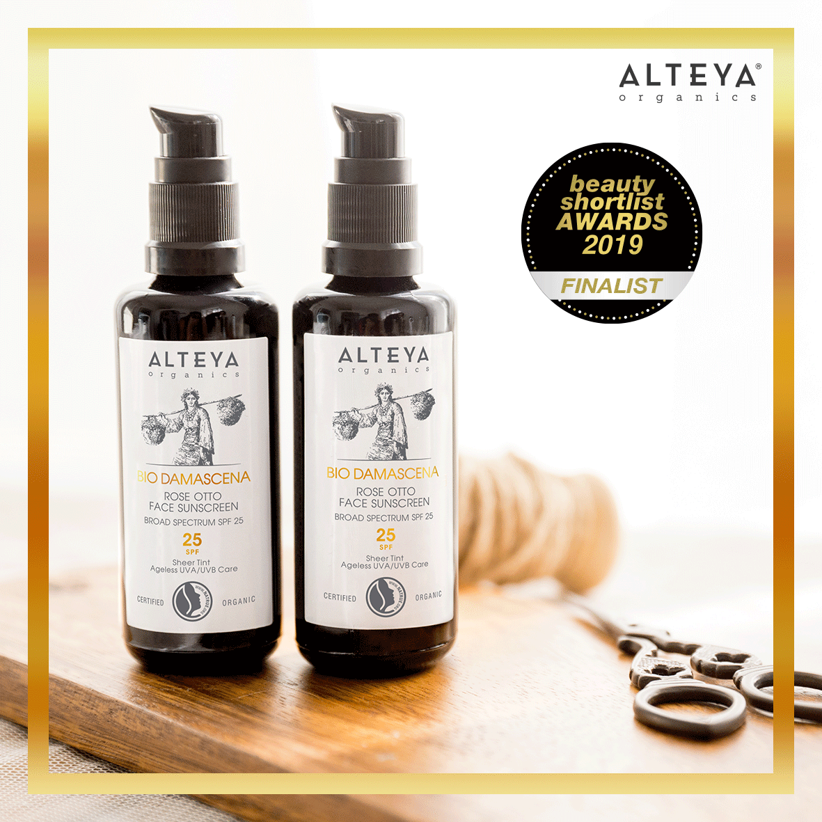 Two bottles of Alteya products showcasing the beauty of Bulgarian rose fields on a cutting board.
